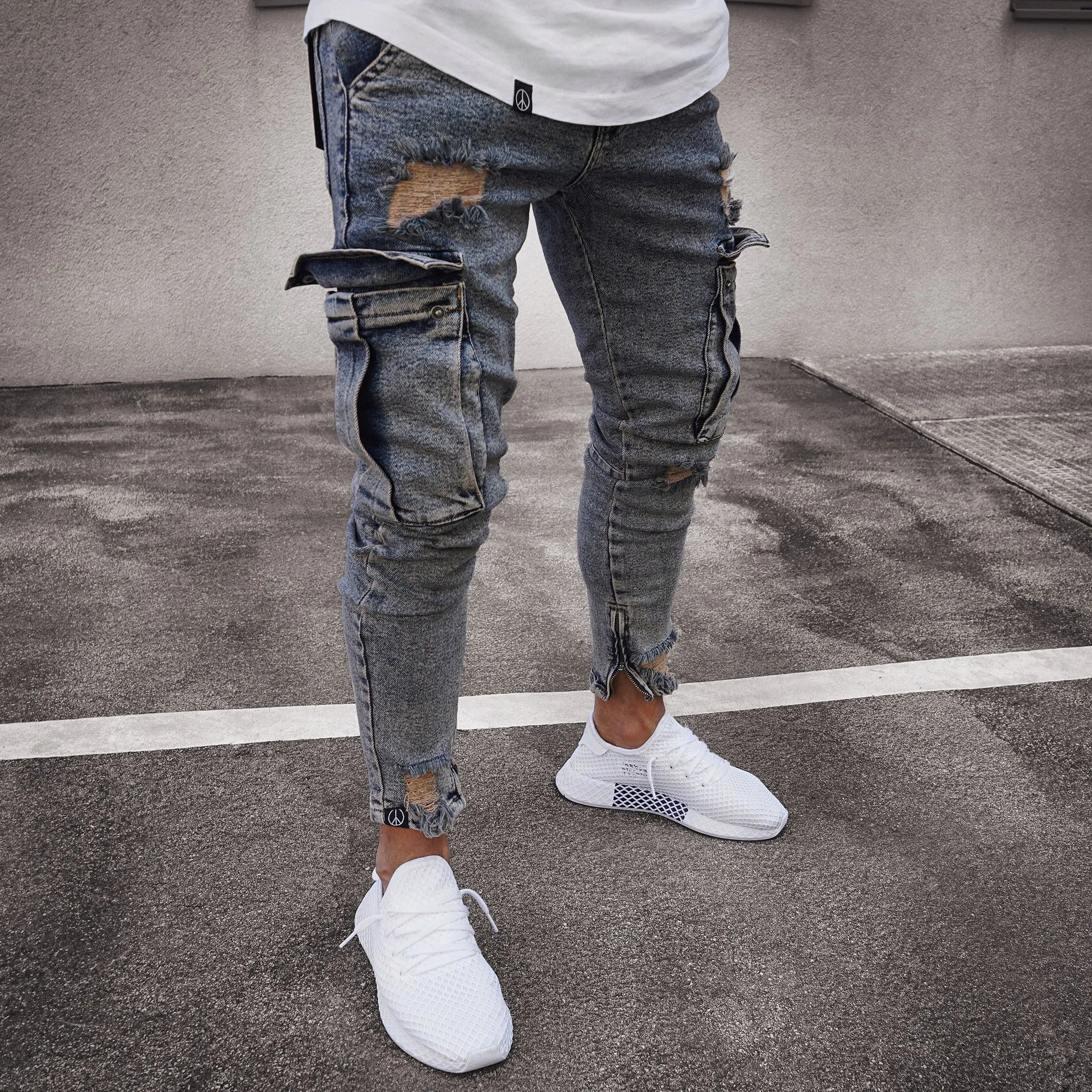 Trendy knee ripped zipper pencil denim trousers